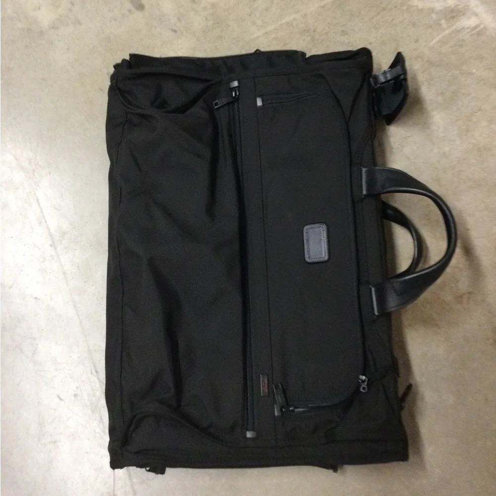 Tumi Black Men's Travel Duffel with Front Zip Pocket and Carry Handles